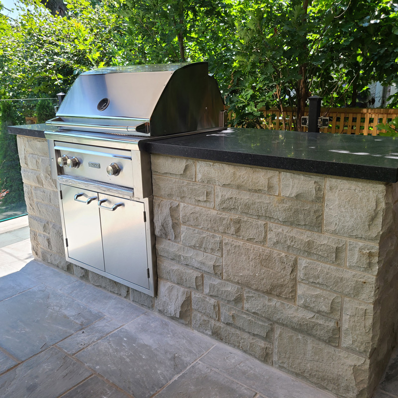 outdoor stone grill and kitchen